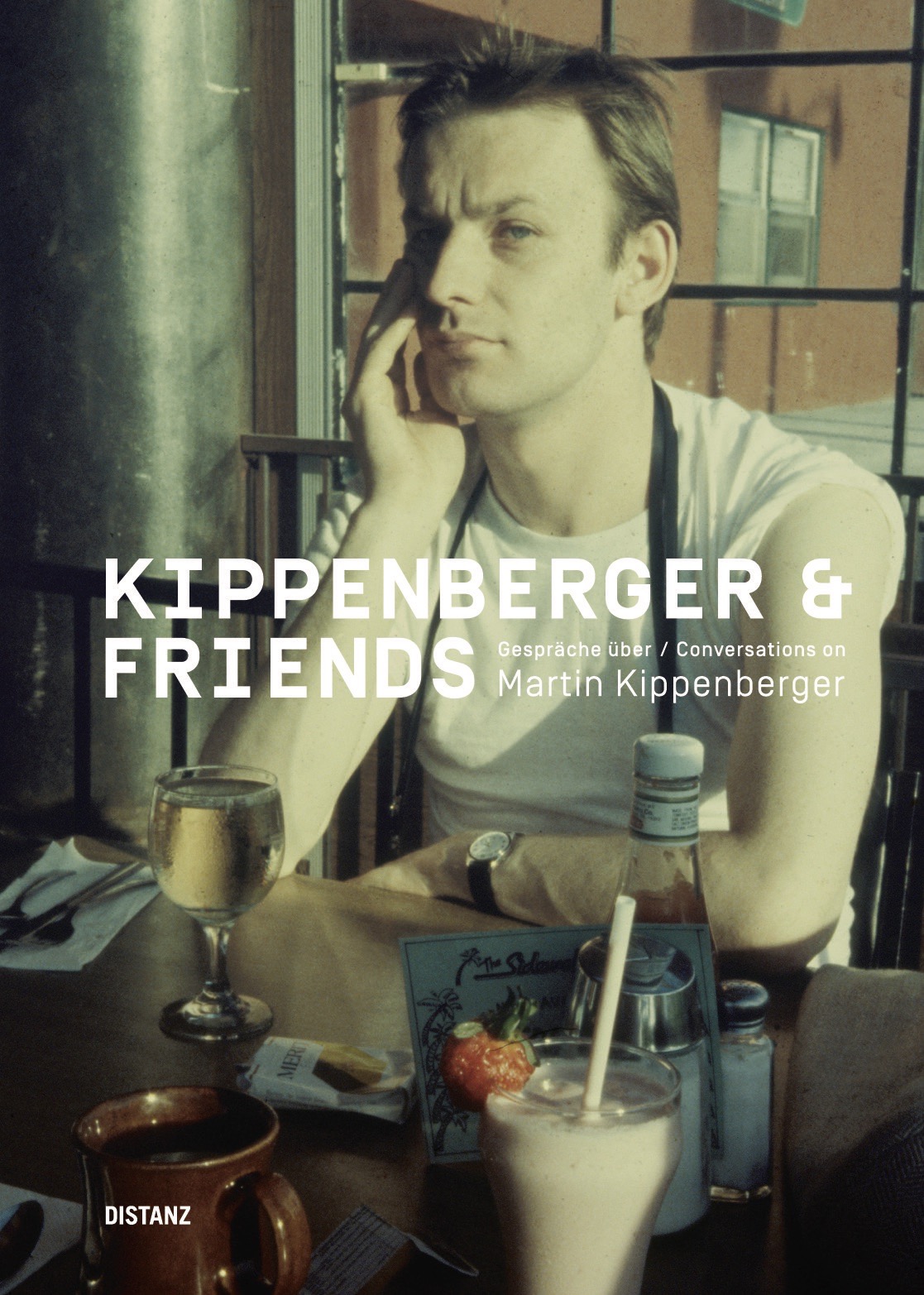 Buchcover Gespräche über / Conversations on Martin Kippenberger
